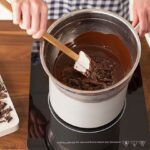 Can chocolate be melted in a plastic bowl over boiling water?