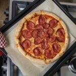 Can you bake 2 frozen pizzas at once?