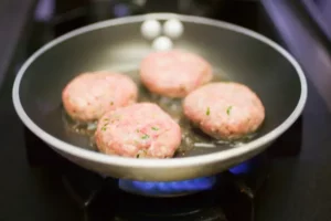 Can you cook frozen burgers in a cast iron skillet