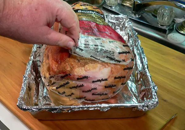 Do you leave plastic on the ham when boiling?