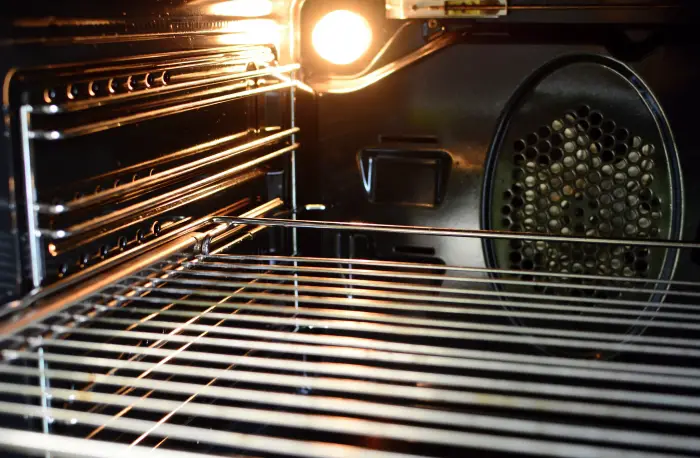 Does oven light affect cooking?