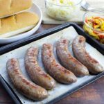 How do you cook precooked brats?