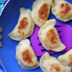 How long can cooked perogies be stored in the refrigerator