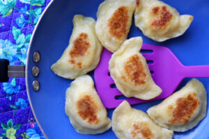 How long can cooked perogies be stored in the refrigerator