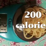 How many grams are 2 oz of cooked pasta?