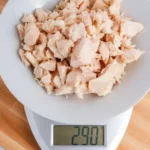How much does raw chicken weigh when cooked?