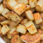 Often asked: How to cook frozen diced potatoes in the oven?
