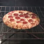 What happens if you bake a pizza with the cardboard?