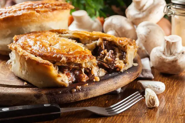 What temperature should a meat pie have when it is cooked?