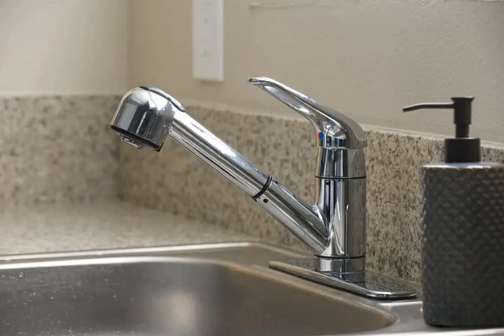 how do you remove the handle from a glacier bay kitchen faucet