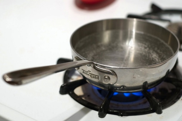 how to boil water faster on a gas stove